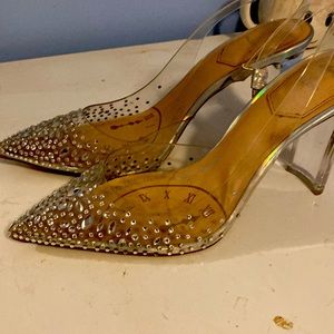 Beautiful shoes missing a few rhinestones.